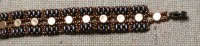 Pulsera de abalorios dorados con piedras duos de cristal